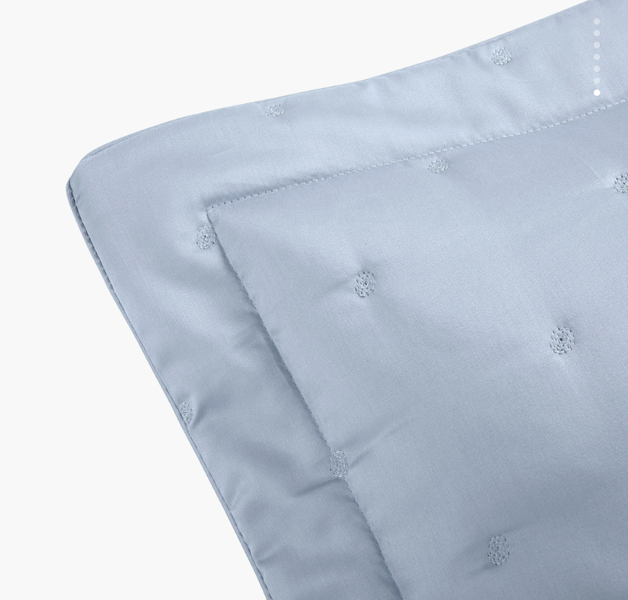 TRIOMPHE CELESTE (blue) QUILTED SHAM EURO by Yves Delorme