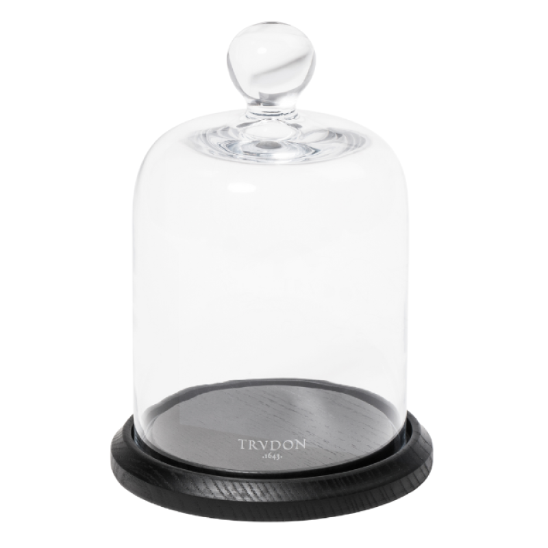 Trudon La Cloche hand-blown glass bell jar with wooden base over a Classic Candle
